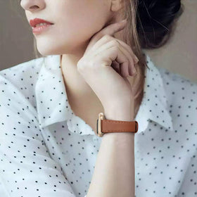 EDIMENS pin-and-tuck closure strap keeps watch snug and tidy.