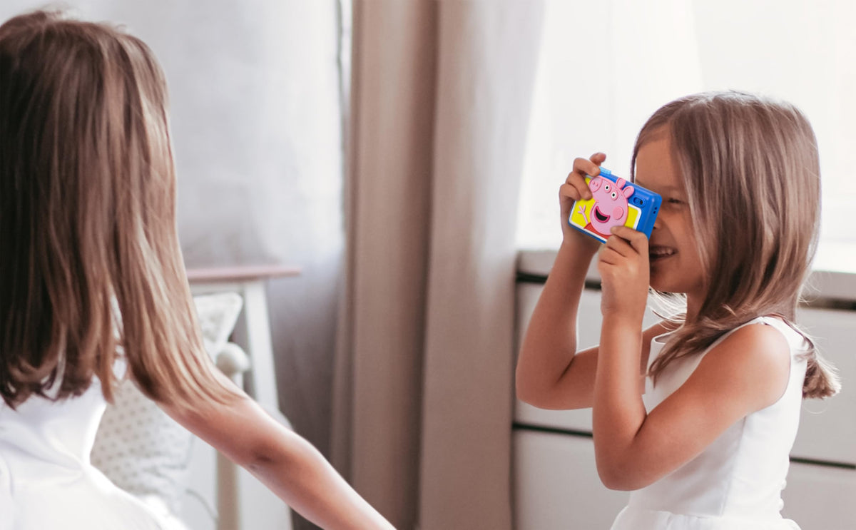 eKids Peppa Pig shows built-in stickers on screen for fun photo decorations