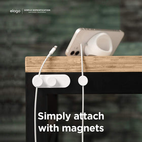 elago buttons on desk setup keeping cords organized and accessible