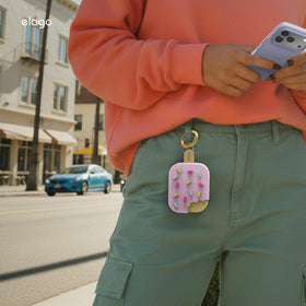 elago Ice Cream Case next to keys showing compact scale and pocket-friendly portability