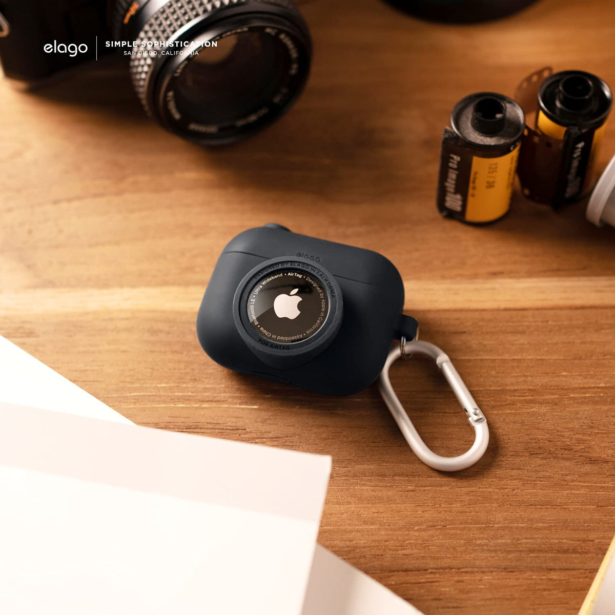 elago Snapshot displaying AirTag in lens slot for easy tracking benefit