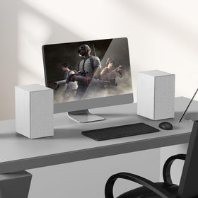 Elimavi speaker next to hand illustrating compact size and easy placement on shelves