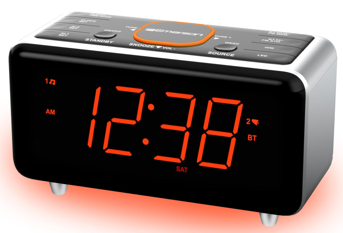 Compact Emerson clock resting on a nightstand