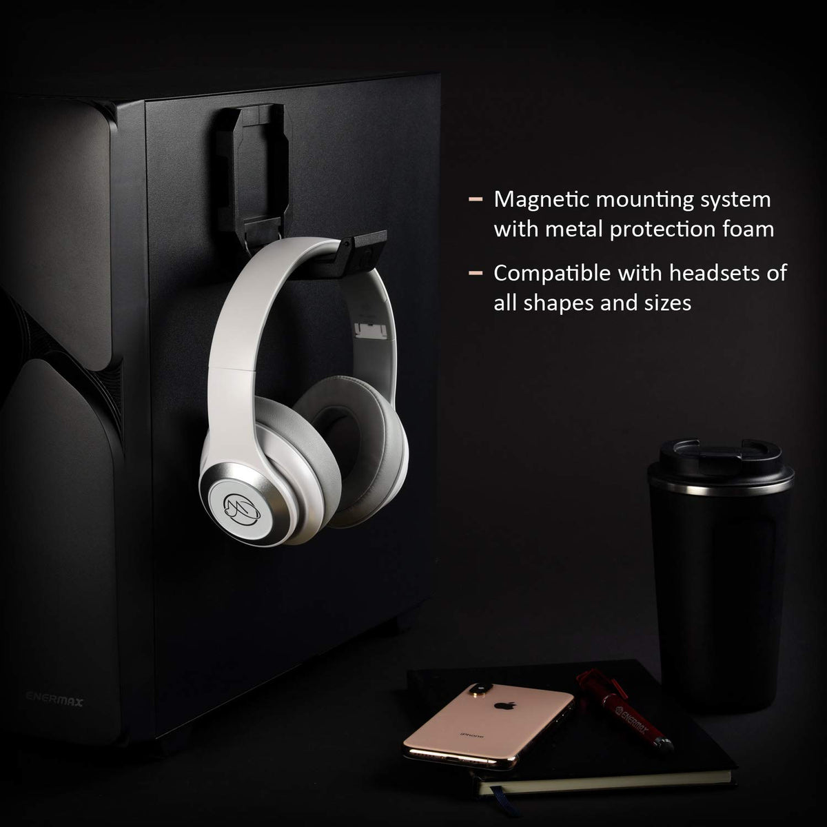 Enermax headset holder features slanted wingtip keeping headsets in place.