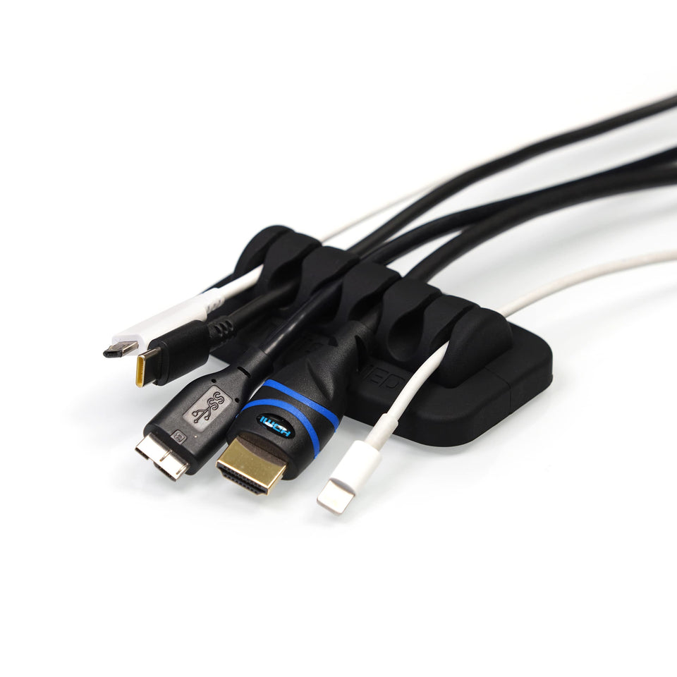 ENVISIONED desktop cable organizer close-up of the non-slip silicone base that keeps cables within reach.