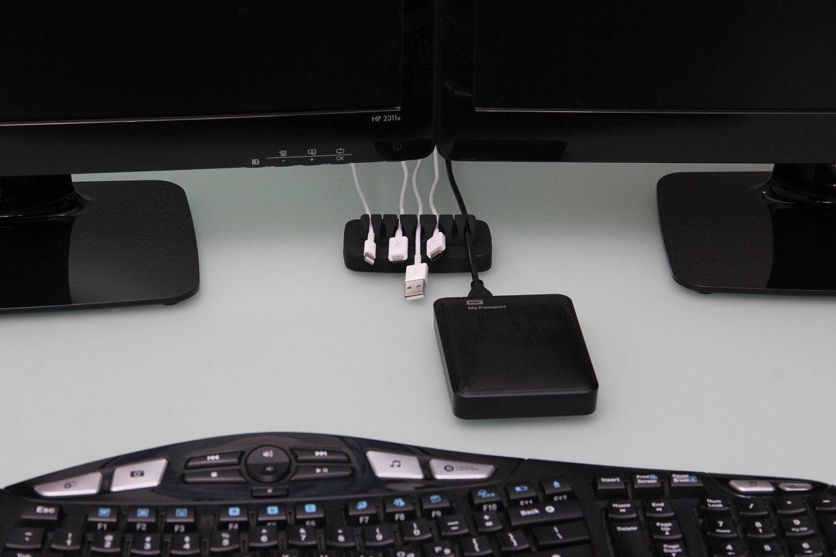 ENVISIONED patented cable holder featuring 7 slots for small and large cables