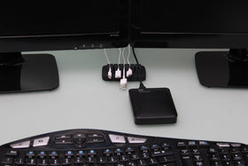 ENVISIONED patented cable holder featuring 7 slots for small and large cables