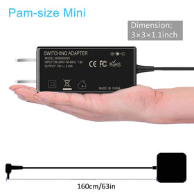 Tip closeup of Eokoowo 65W charger showing compatibility with VivoBook.