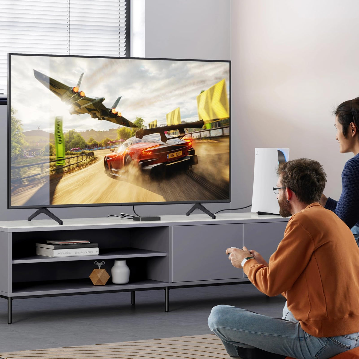 ExploreHome lifestyle shot of TV on console showing improved stability and aesthetics