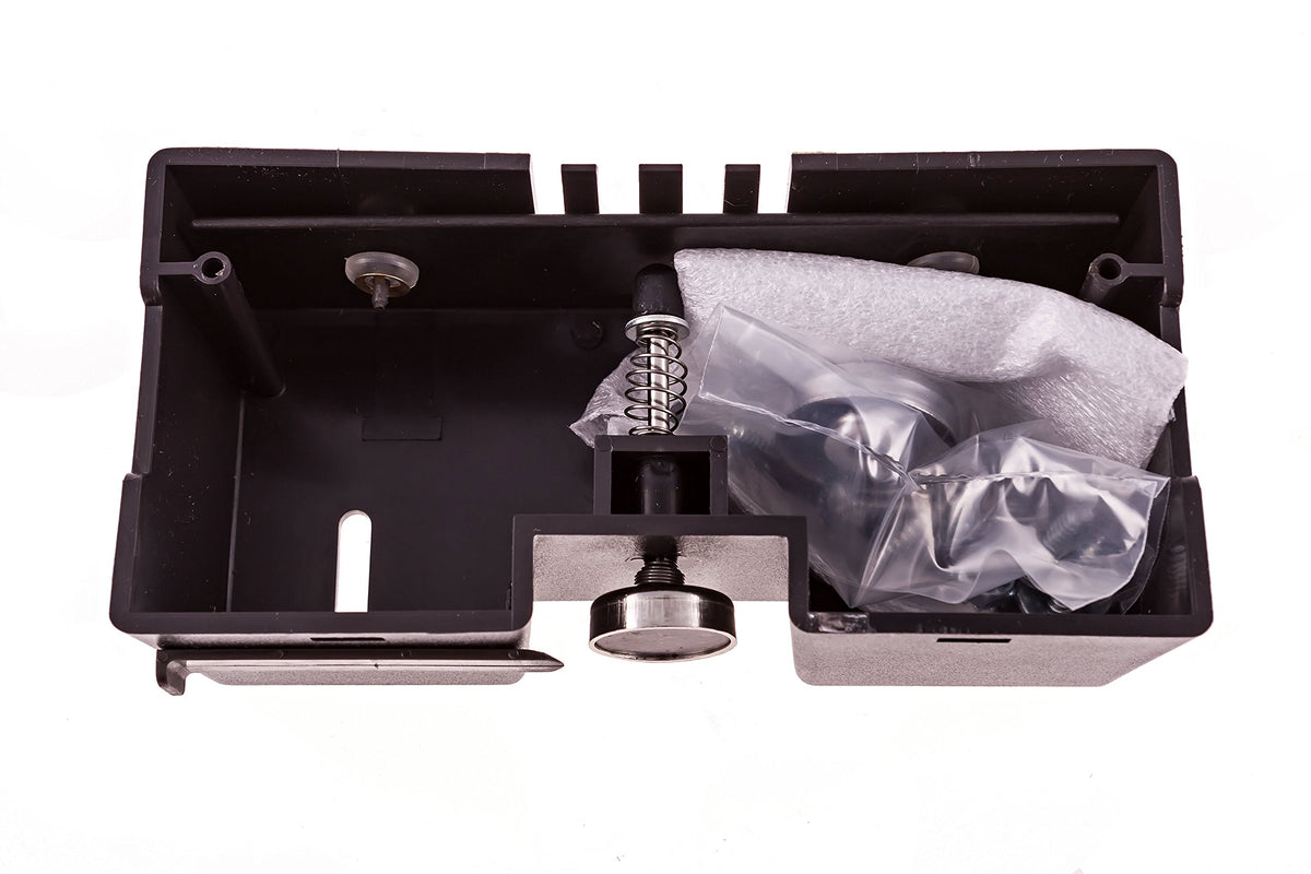 EZ Tone entrada Alerta beside a ruler showing compact size and space-saving benefit