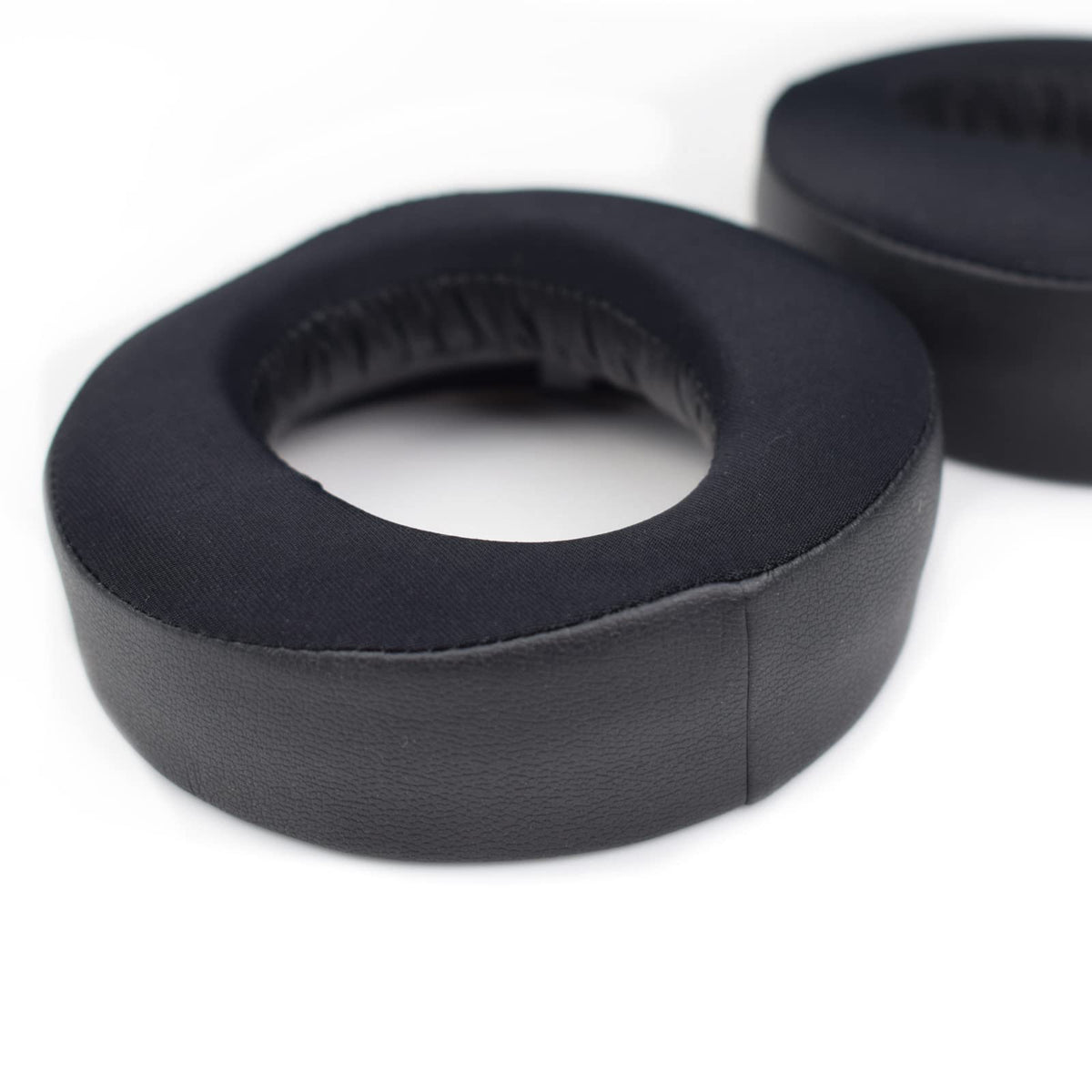 Fadmew lifestyle image of headset with pads in a gaming setup showing longer sessions