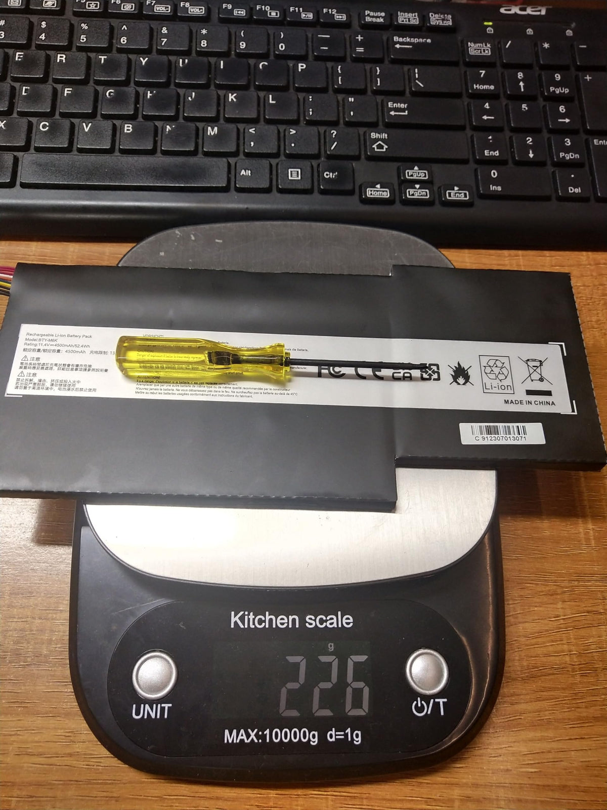 Fancy Buying BTY-M6K lifestyle shot in a laptop on desk showing productive mobility