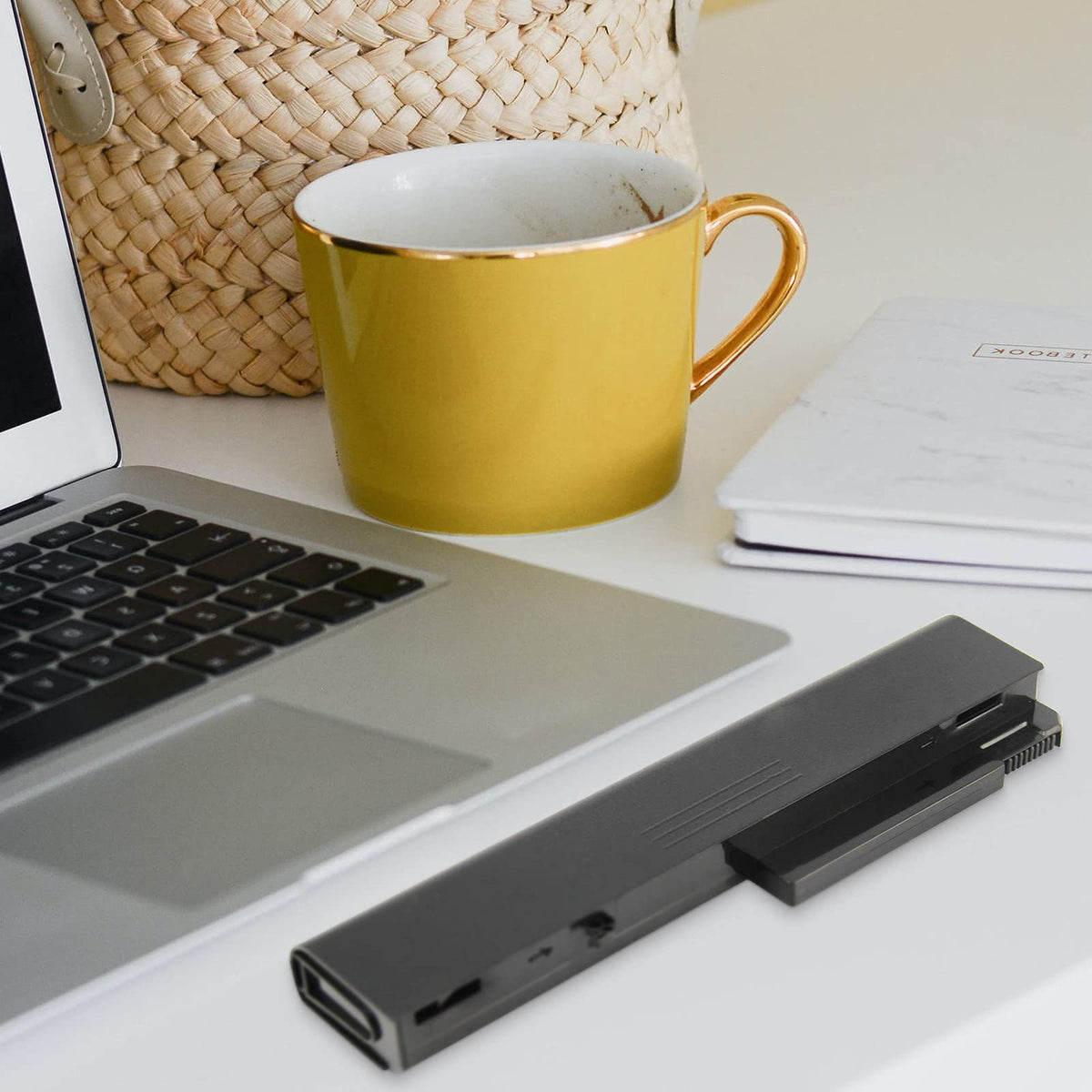 Fancy Buying lifestyle scene in cafe showing longer laptop runtime