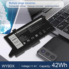 Fancy Buying battery with laptop on a desk showing practical use and mobile productivity