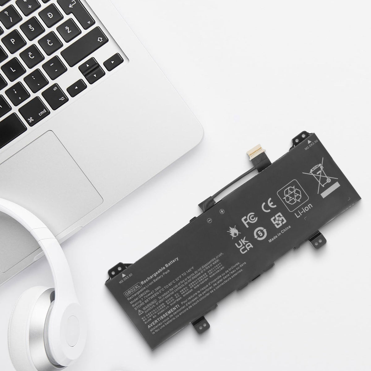 Fancy Buying battery next to ruler indicating accurate size fit