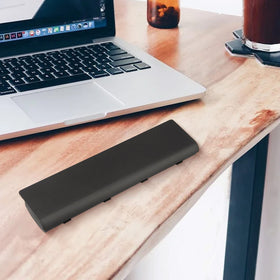 Fancy Buying powering laptop on desk showing longer runtime benefit