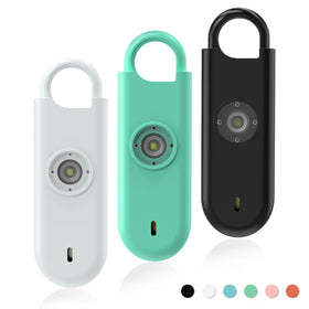 Fauxomor 140dB alarm front view with discreet safety keychain and strobe for quick awareness.
