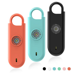 Fauxomor 140dB alarm keychain in orange for quick personal safety and deterrence.