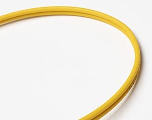 FCD LC connector close-up showing ceramic ferrule for precise alignment and low insertion loss