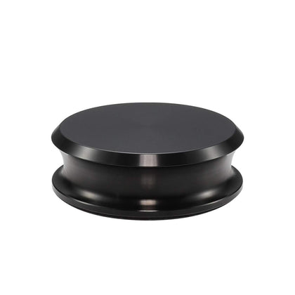 FEMELI record weight stabilizer under dust cover on a turntable for safer playback.