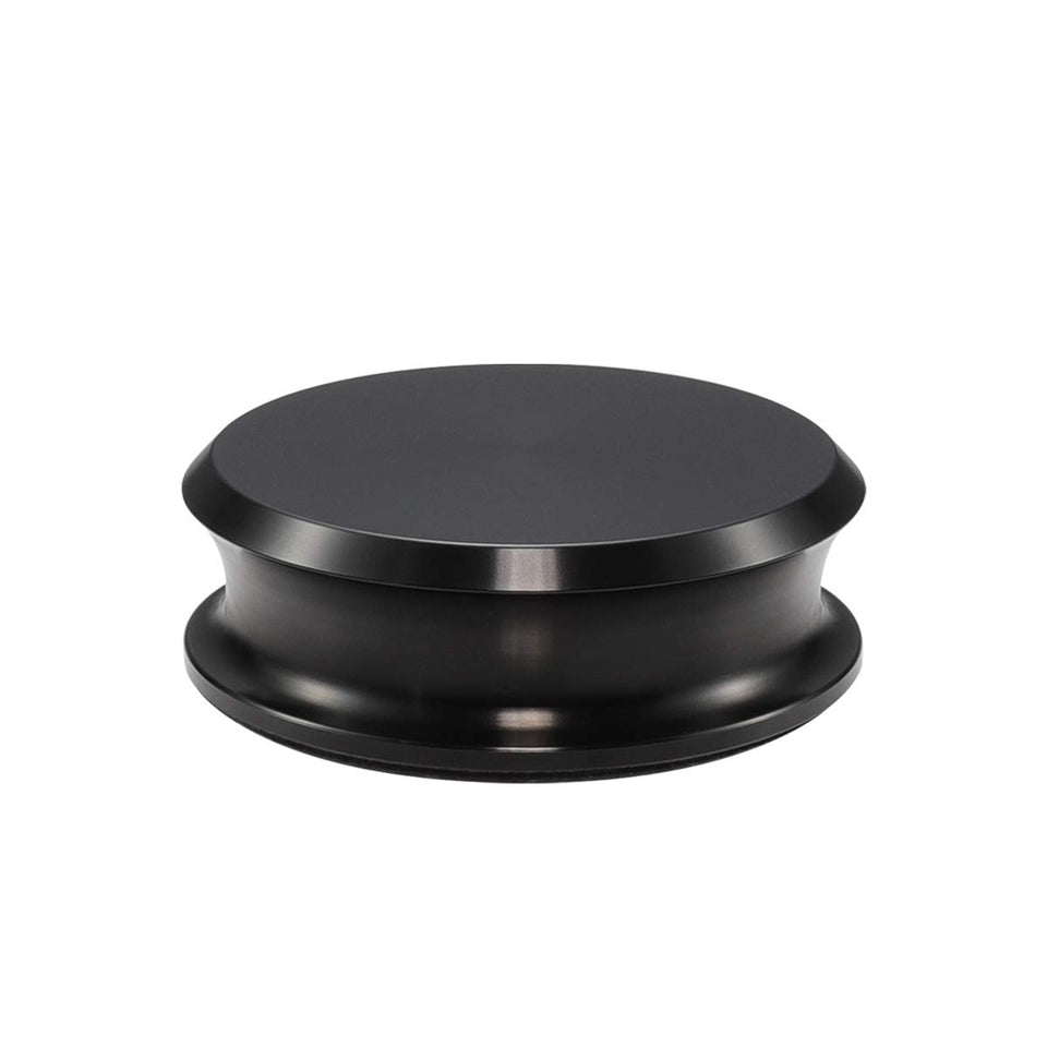 FEMELI record weight stabilizer under dust cover on a turntable for safer playback.