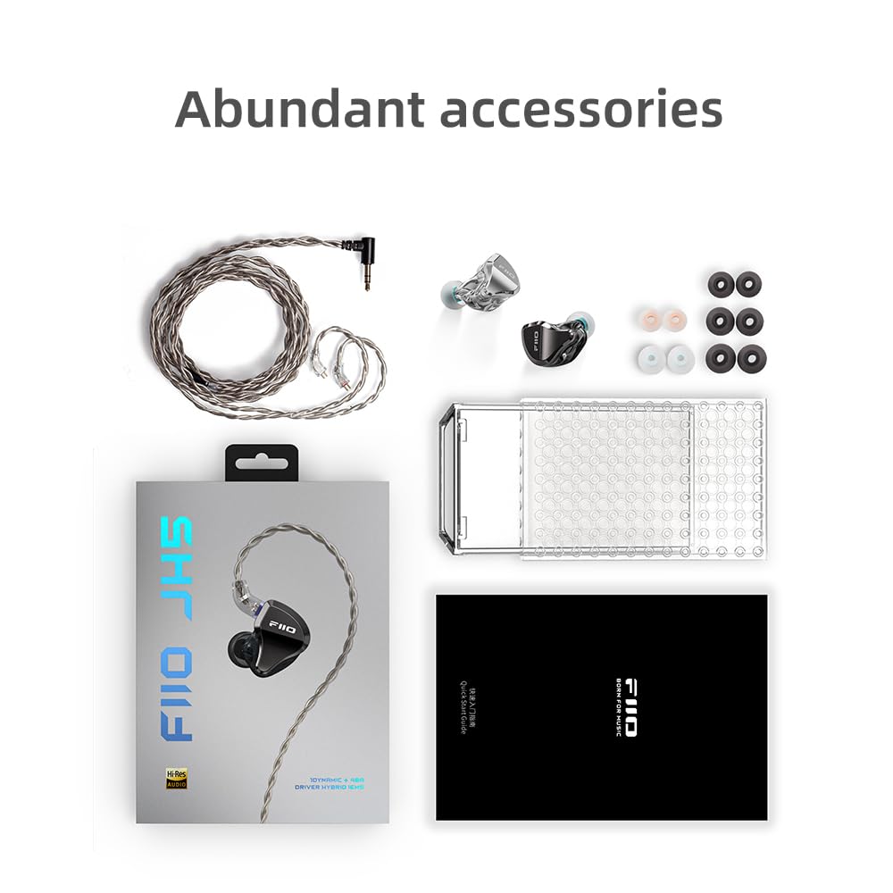 FiiO JH5 next to coin for scale, showing compact size and portability benefit