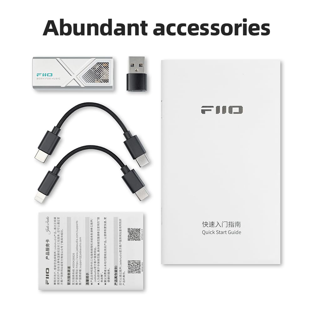 FiiO KA13 beside a credit card showing compact pocketable size and travel convenience
