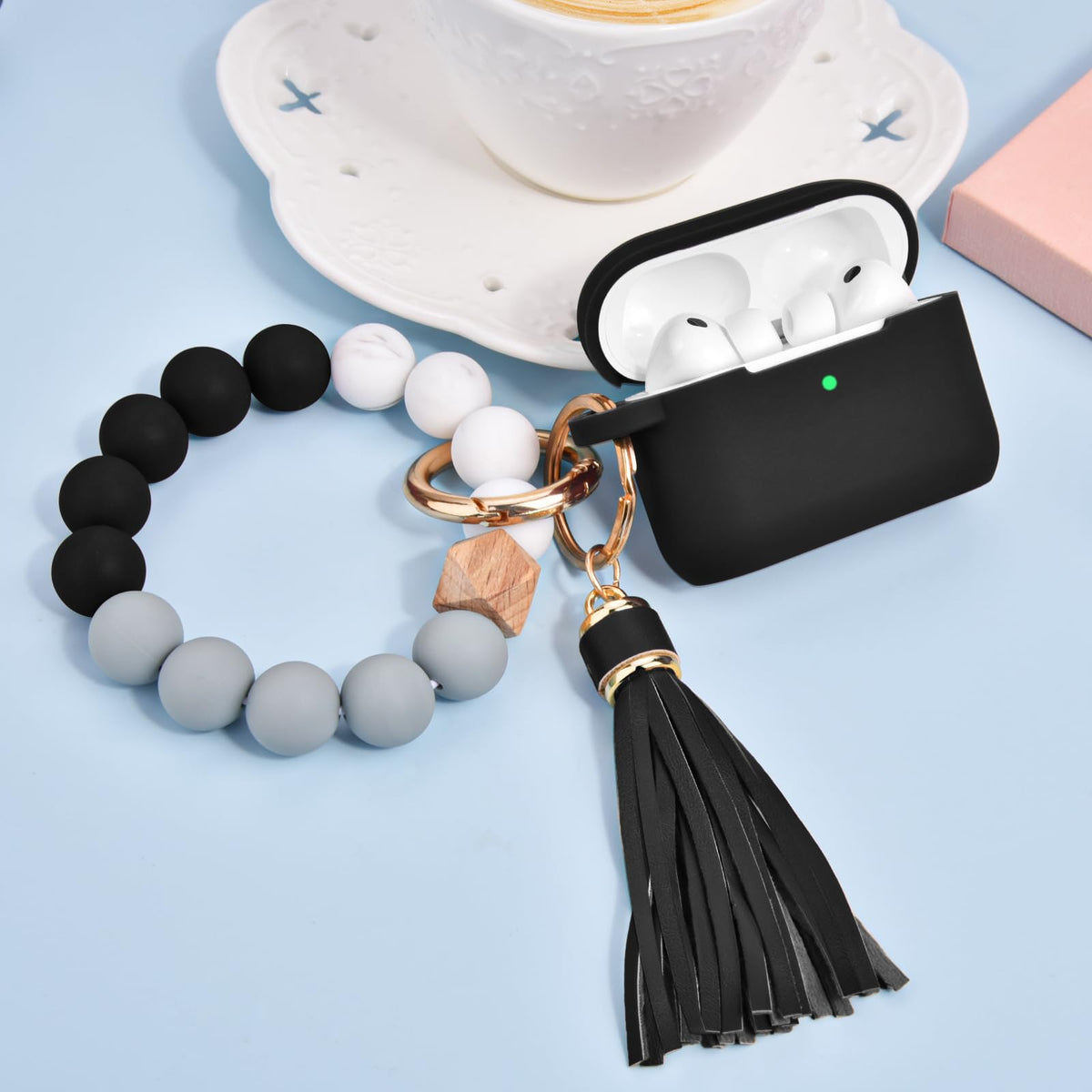 Filoto AirPods Pro 3 case with beaded bracelet keeps accessories handy.