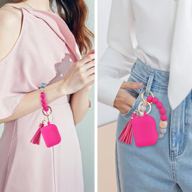 Filoto clipped to a bag showing travel-ready protection and quick access
