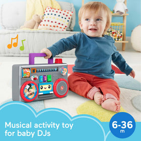 Fisher-Price Laugh and Learn Busy Boombox cassette deck opens for discovery and play