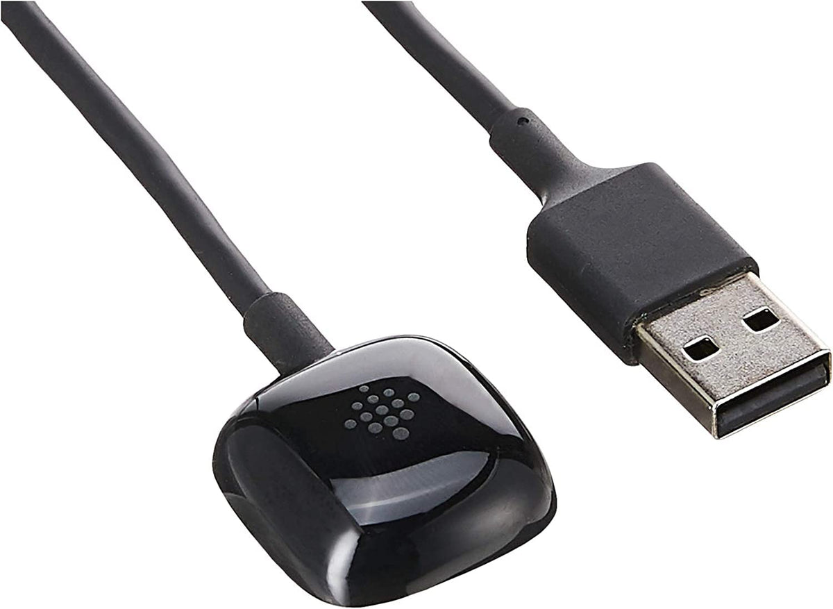 Fitbit Sense charging cable with magnetic holder keeps the watch secure during charging.