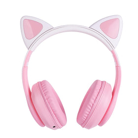 FLOKYU child wearing headphones during study showing fit and hands-free mic use