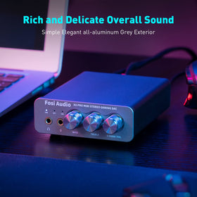 Compact Fosi Audio K5 Pro DAC amplifier on a desktop