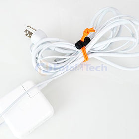 Foto&Tech elastic cable tie 16cm orange organizes gear for quick access.