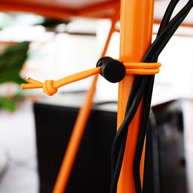 Foto&Tech tangle-tamer close-up helps cords stay organized and tangle-free.