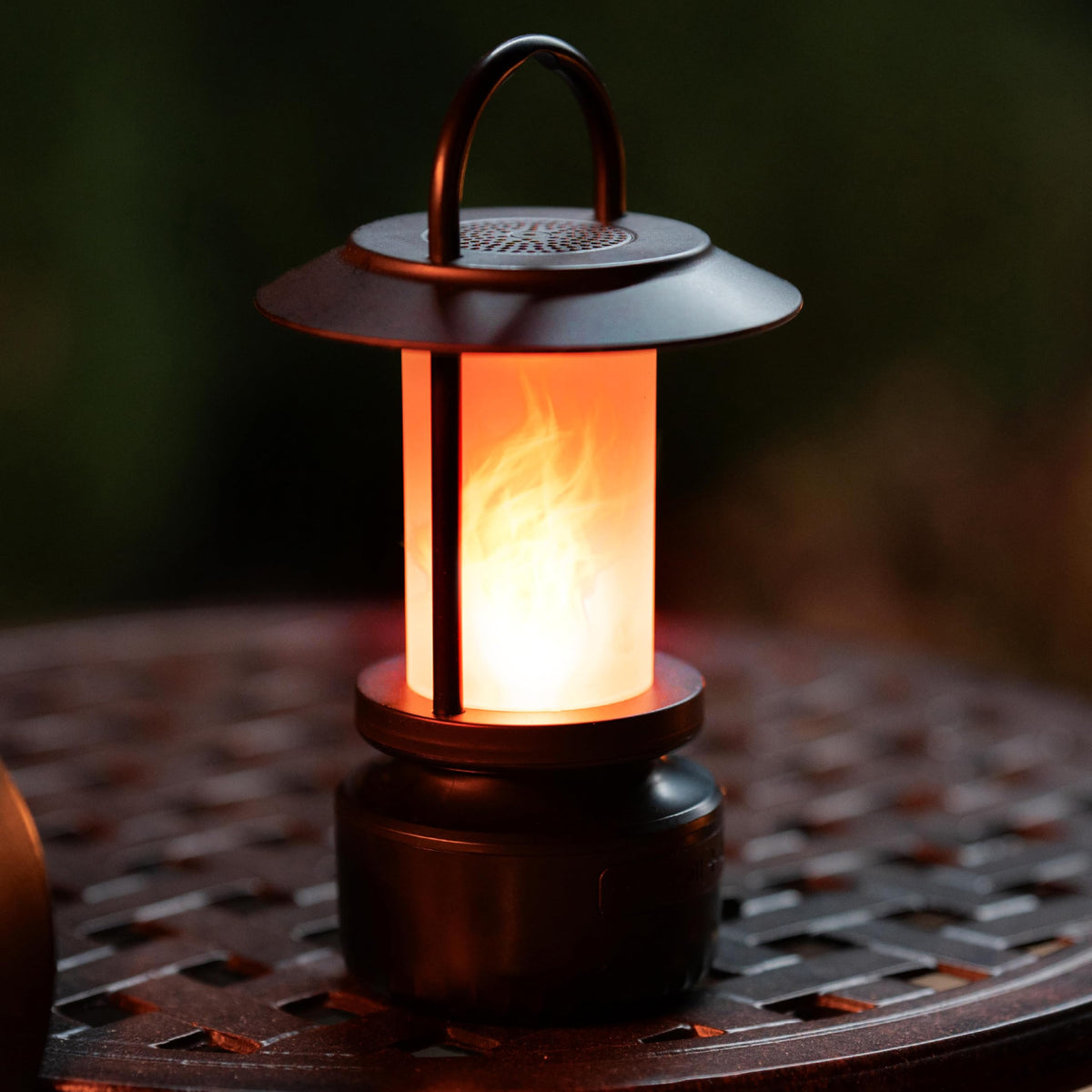 FoxFlame in backyard at night, adds decorative light and music