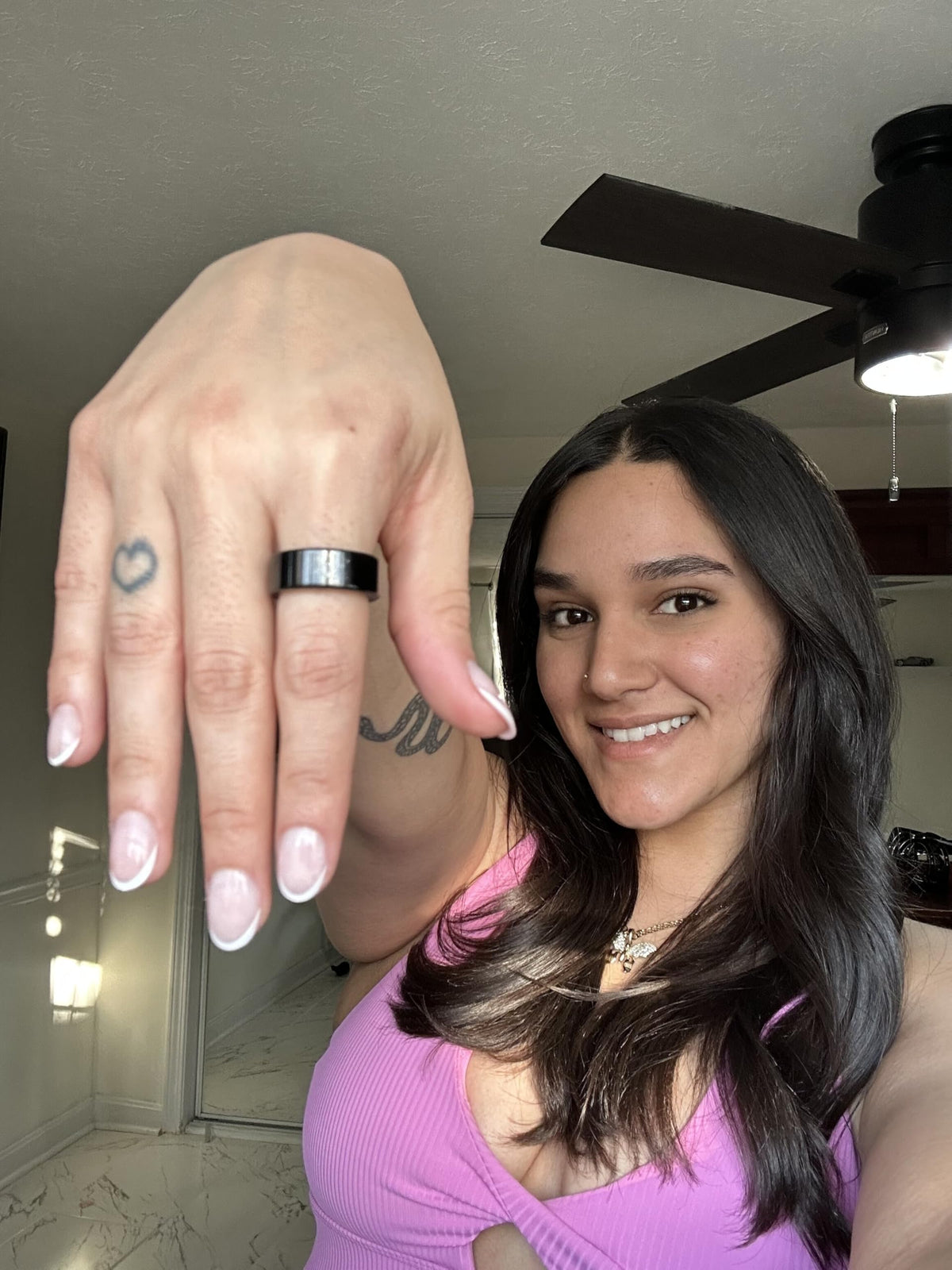 FREEZE2TRIM ring worn on hand in lifestyle scene for discreet all-day tracking benefit