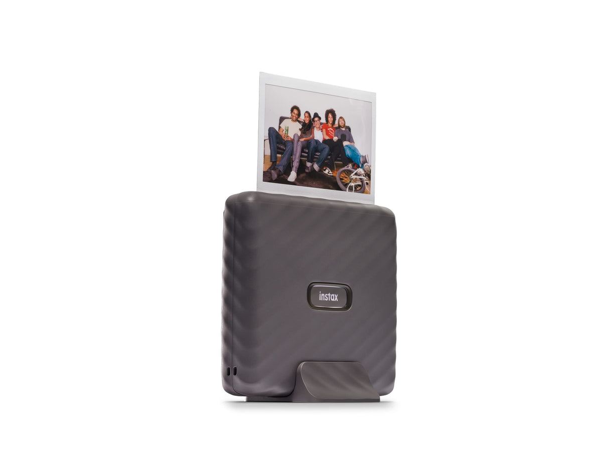 Instax Link Wide app editing screen showing filters and text for personalized prints.