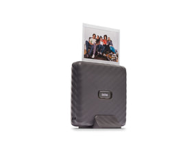 Instax Link Wide app editing screen showing filters and text for personalized prints.