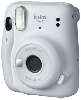 Fujifilm Instax Mini 11 Ice White selfie mirror demonstrates easy face framing for selfies.