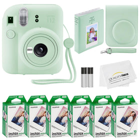 Fujifilm Instax Mini 12 camera in mint green ready for instant memories.