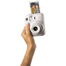 Fujifilm Instax Mini 12 indoor lighting scene with automatic exposure.