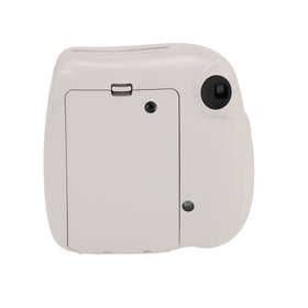 Fujifilm Instax Mini 7+ selfie-mirror closeup, framing quick self-portraits with ease.