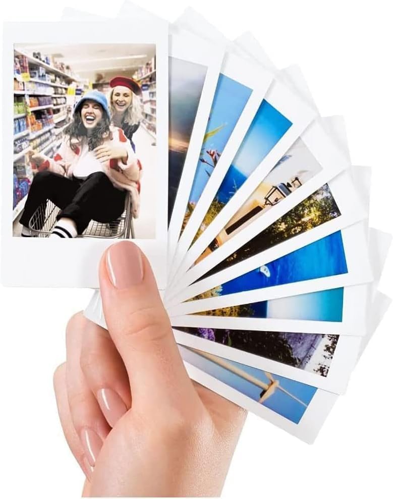 Fujifilm film cartridge loaded in Instax camera capturing a moment