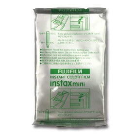 Using Instax Mini film with camera for quick, tangible memories on the go.