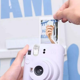 Fujifilm Instax open film cartridge revealing loading ease and compatibility