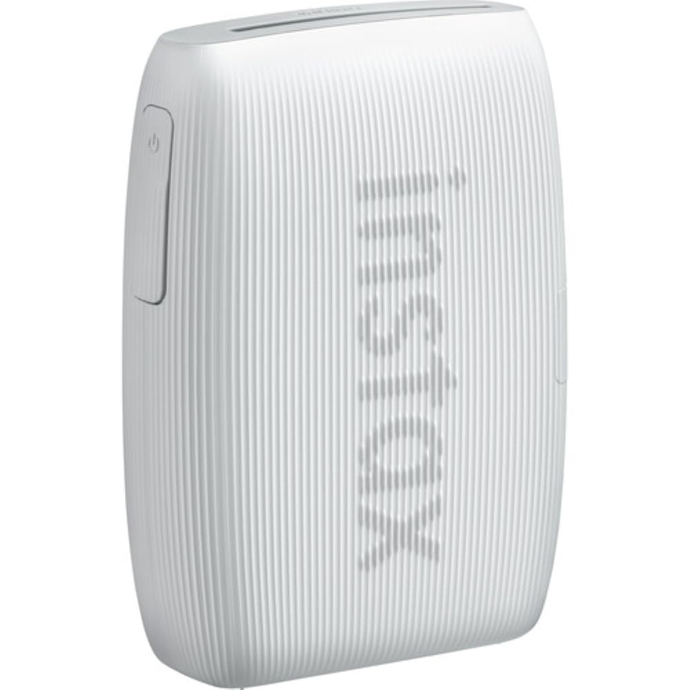 Printer connected to the INSTAX app for on‑the‑go printing from a phone