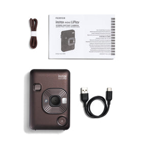 Fujifilm INSTAX Liplay contents: hand strap, USB-C cable, user guide, 1-year warranty.