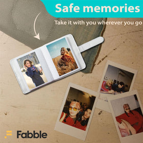 Instax Mini photo album holds 32 prints for organized keepsakes.