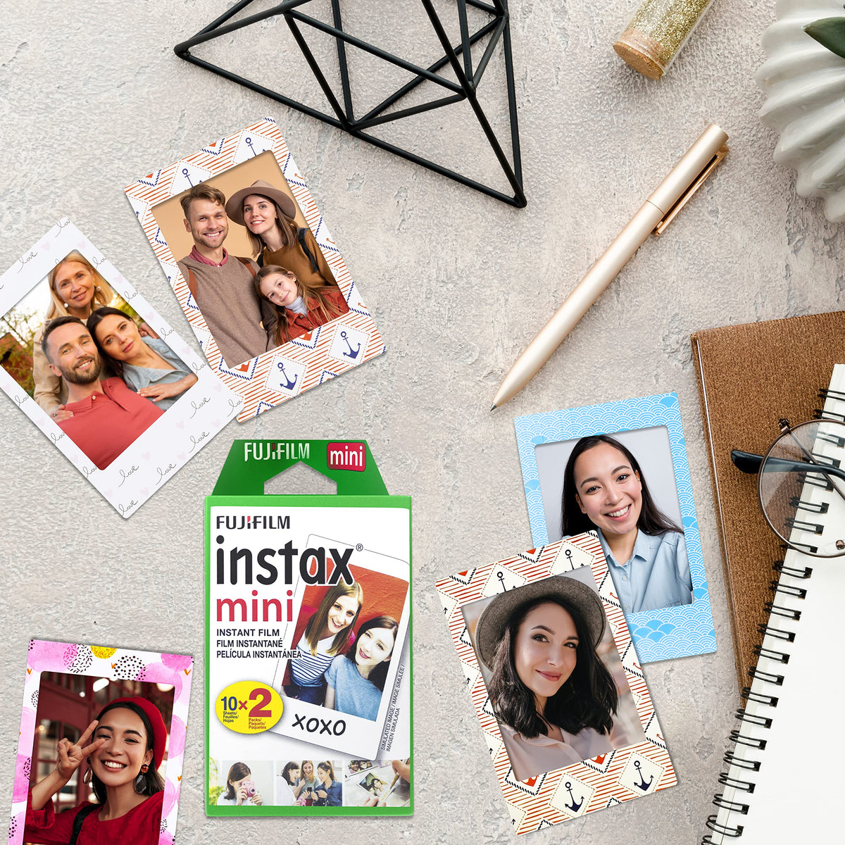 Fujifilm photo beside credit card showing Instax Mini print size for scale